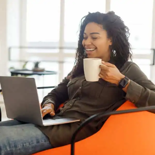 Woman relaxing comfortably at home